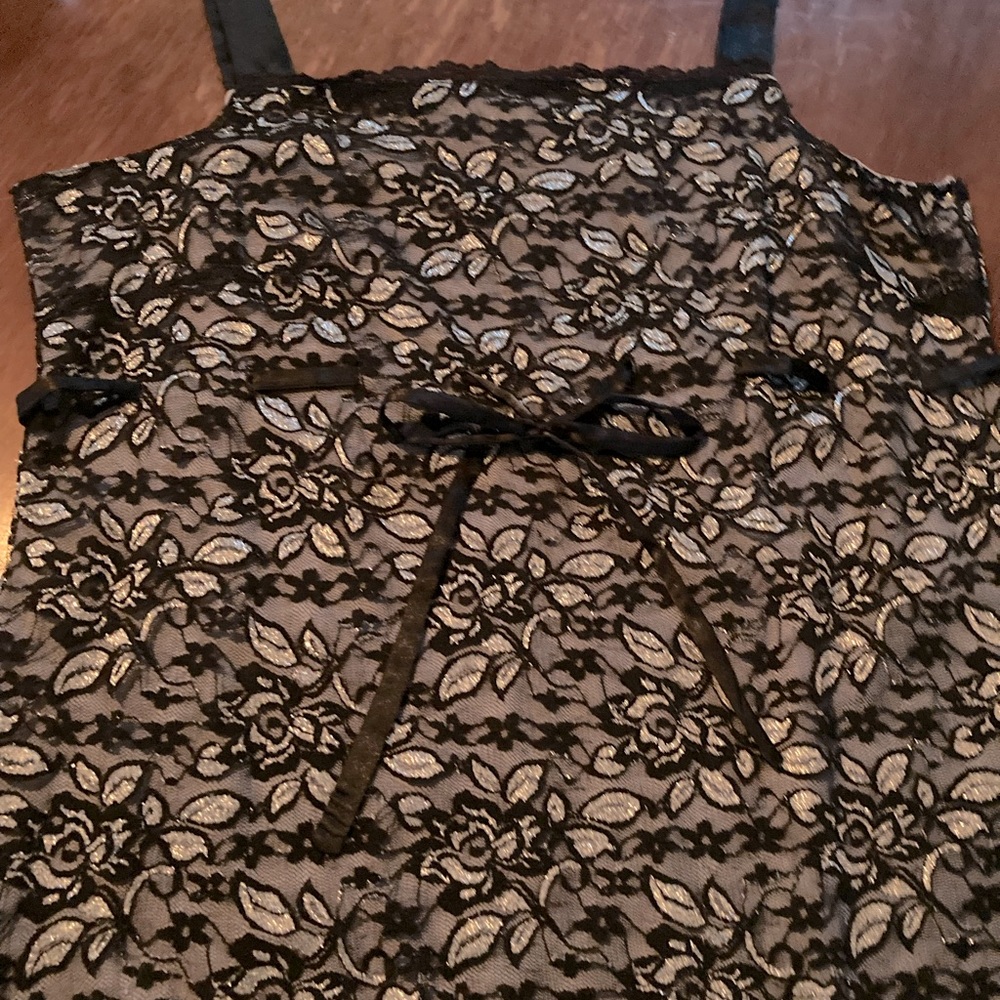 Dressy tank top black lace with silver lining. Size L